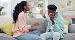 Angry, fight and black couple on a living room sofa with divorce and marriage problem talk. Home, relationship crisis and conflict with frustrated young people together with trouble and anxiety