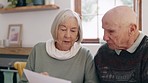 Document, discussion and senior couple in dining room for mortgage, financial bills or debt payment. Paperwork, conversation and elderly man and woman in retirement talking for pension budget at home