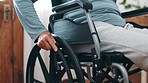 Man, hands and home for moving wheelchair, learning or recovery from injury, accident or closeup. Person with disability, mobility chair and push for progress, transport and rehabilitation in clinic