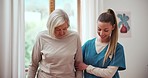 Physiotherapist, patient and assistance with walking in hospital for recovery, injury or rehabilitation. Elderly woman, help and talk with caregiver from surgery, mobility and support in facility 