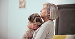 Senior woman, dog and cuddle in bedroom with love, care and pet friend for loneliness in retirement. Elderly person, domestic animal and bonding with carefree together, puppy kiss and touch in home