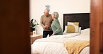 Senior, couple and help with walking in home for assistance for mobility, movement or injury in bedroom. Elderly, man and woman for love, trust or support in bond for care recovery or rehabilitation