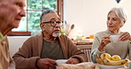 Tea party, friends and talking with old people in a retirement home together for bonding in the morning. Smile, breakfast and a group of happy seniors chatting in the living room of an apartment