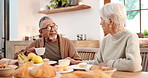 Tea party, friends and old people talking in a retirement home together for bonding in the morning. Smile, drink and a happy senior people chatting in the living room of an apartment for conversation