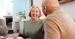 Tea party, elderly friends and laughing with people in a retirement home together for bonding in the morning. Smile, funny and a group of happy seniors chatting in the living room of an apartment