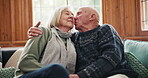 Senior couple, happy and kissing with hug, marriage and embrace for love, home and retired. Retirement, elderly and smile for commitment, bonding together and care for relationship, man and woman
