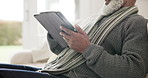 Mature, man and tablet scroll in home closeup for reading article, internet connection or entertainment. Black male person, touch screen and hands or information search, online web or social network