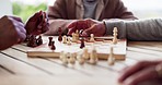 Hands, chess and game for strategy in closeup of board, challenge or tournament for outside, park or garden. Elderly people, together and fun with activity for thinking, problem solving and planning