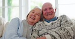 Love, smile and face of senior couple on a sofa in the living room for comfort and bonding together. Happy, romance and portrait of elderly man and woman in retirement in the lounge of modern home.