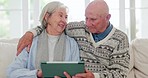 Home, hug and senior couple with tablet, typing and connection with social media, conversation and lens flare. Apartment, elderly man and old woman with technology, mobile user and network with app