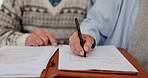 Hands, couple and sign contract on paper, agreement and insurance or legal document. Senior people, marriage and form questions on application for retirement, planning for future in closeup at home