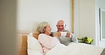 Coffee, toast and senior couple in a bed with love, bond and vacation freedom in their home together. Bedroom, cheers and elderly people relax in a house with tea celebration for retirement success