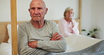 Divorce, conflict and senior couple in bedroom, marriage crisis and fight in home. Bed, frustrated elderly man and woman ignore after cheating, relationship fail and arms crossed, depression and sad