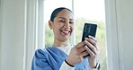 Phone, laugh and happy woman doctor at a hospital with social media, chat or communication. Healthcare, meme and female nurse with smartphone app for comic, streaming or texting, gif or reading email