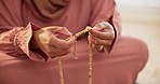 Islamic, beads or hands of person in prayer to God in faith, devotion or worship for Eid or ramadan. Counting closeup, muslim or calm Arabic woman sitting in home for fasting, gratitude or wellness