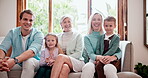 Big family, face and smile on sofa with love, support and bonding in living room of home for relationship. People, men and women with children, portrait and happy on couch in lounge for relaxing