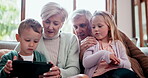 Children, grandparents and tablet on sofa or playing, talking or games in conversation. Girl, boy and elderly couple or online connection on social media in digital streaming, internet tech or movies