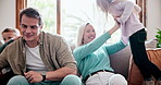 Family, playing and laughing on couch, tickle and bonding on sofa, love and having fun for connection. Parents and children, embrace and funny or comedy, relax and silly or humor, goofy and happiness