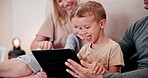 Parents, children and tablet in bedroom, watching and playing in bed, funny face and smile. Happy, enjoying and online for childhood, digital and internet in family home, games and bonding together