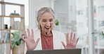 Senior woman, laptop and greeting in video conference, waving and office or technology. Elderly businesswoman, website and internet for communication, networking and virtual meeting for discussion