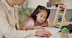 Mother, daughter and talking for homework with helping, math and learning for education at dining table. Family, woman and girl child with homeschooling, communication and counting in lounge of home