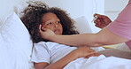 Sick, hands and girl child with thermometer to check or monitor wellness on bed in bedroom of home. Healthcare, woman or mother for medical support, help or care for ill kid with flu, fever or virus