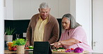 Healthy, cooking and senior couple with tablet in kitchen for online recipe, guide or learning from video. Diet, food or old people reading nutrition app, blog or meal prep with plan for vegetables