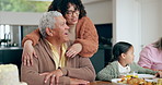 Woman, hug senior father and dinner table in family home with love, bonding and care with funny conversation. Girl, elderly dad and embrace with chat, talk and comic memory in house for crazy joke