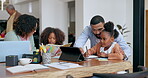 Family, study or remote work with parents and children at a dining room table in their home for work or education. Tech, books or distance learning with a mother, father and kids in their apartment
