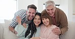 Love, senior parents and daughter and son on sofa for bonding, hug and affection in home. Happy family, portrait and adult children visit mature mom and dad for embrace, relax or fun in living room