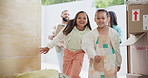 Children, moving box and happy family walking into new house, mortgage and real estate success. Home, face and excited girl kids smile with parents at a front door of dream, apartment or property