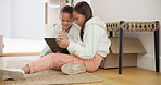 Moving, games and kids with tablet in home online with application to relax and play online. Girl, children and bonding with technology, website or happiness in new house, apartment and planning 