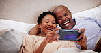 Home, bed and black couple with a cellphone, funny and morning with connection, humor and relax. Bedroom, man and woman with a smartphone, bonding together and happiness with a weekend break and love