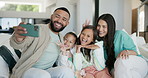 Parents, children and selfie on sofa in family home with peace sign, comic smile and happy in living room. Father, mother and daughter kids with icon, emoji and symbol with bunny ears on lounge couch