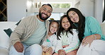 Love, face and happy family on a sofa with hug, support and bonding in their home together. Security, care and portrait of mother, father and girl kids embrace in living room with trust or protection