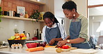 Home, cooking and black family with mother, girl and love with food, bonding together and lunch. Parent, mama or kid with ingredients, learning or teaching with childhood development, kitchen or meal