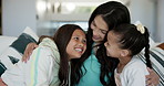 Love, hug and mother with girl children on a sofa with support, care or trust in their home. Happy family, smile and mom with kids in a living room for conversation, bonding or fun weekend freedom