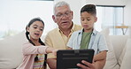 Relax, kid or grandpa with tablet for elearning or studying for remote learning education on sofa. Family, siblings talking or grandfather with kids reading ebook or streaming video or movies at home