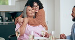 Senior mother, woman and hug in living room with family, love and support in retirement. Happy, mothers day and people embrace in home with care at holiday, dinner or celebration together at party