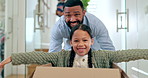 Happy family, moving in new home pushing box for real estate, property or investment and playing together. Excited father and child exploring house, apartment or renovation with boxes in relocation