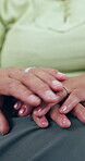 Hands, help and a couple closeup in their home for love, empathy or comfort in time of loss, pain and grief. Support, trust or hope with a man and woman praying for spiritual faith or healing