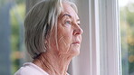 Window, thinking and senior woman or future, alzheimer and anxiety for future, retirement and death. Elderly person, nursing home and depression or mental health, reflection and regret decision