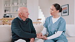 Home, caregiver and senior man on sofa for care, empathy and medical service for consulting. Healthcare, retirement and nurse talking to elderly patient in living room for help, support and wellness