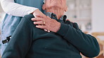 Wheelchair, nurse and senior man holding hands for care, consulting and medical service. Healthcare, retirement home and nurse talking to elderly person with disability for help, support and trust