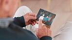 Photograph, memory and old man in home remember woman, event and marriage with nostalgia. Elderly, hands and mourning death of wife or person in vintage picture with love and thinking of history