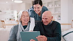 Tablet, healthcare and nurse with senior people on a sofa in the living room of nursing home. Digital technology, medical consultation and female caregiver talking to elderly patients at modern house