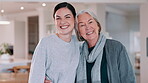 Senior woman, daughter and hug in living room with face, happy and love support in family home. Elderly mother, smile and portrait by child for care, bonding and relax together for wellness in house