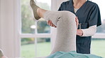 Nurse, hands and patient legs in physiotherapy for exercise, workout or stretching at chiropractor. Closeup of female person, therapist or doctor helping in stretch, joint pain or therapy at house