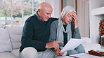 Senior couple, bills and stress for home debt, financial fail or budget risk with documents, hug for support and worry. Angry elderly woman and man with mortgage, loan payment or bankruptcy letter