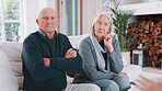 Senior, couple and woman consultation on sofa for retirement budget planning, asset management or paperwork. Old people, meeting and unhappy for pension fund for relax peace, mortgage or finance chat